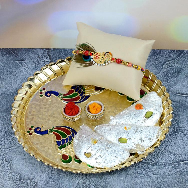 Kaju Gujia & Rakhi in Peacock Golden Puja Thali