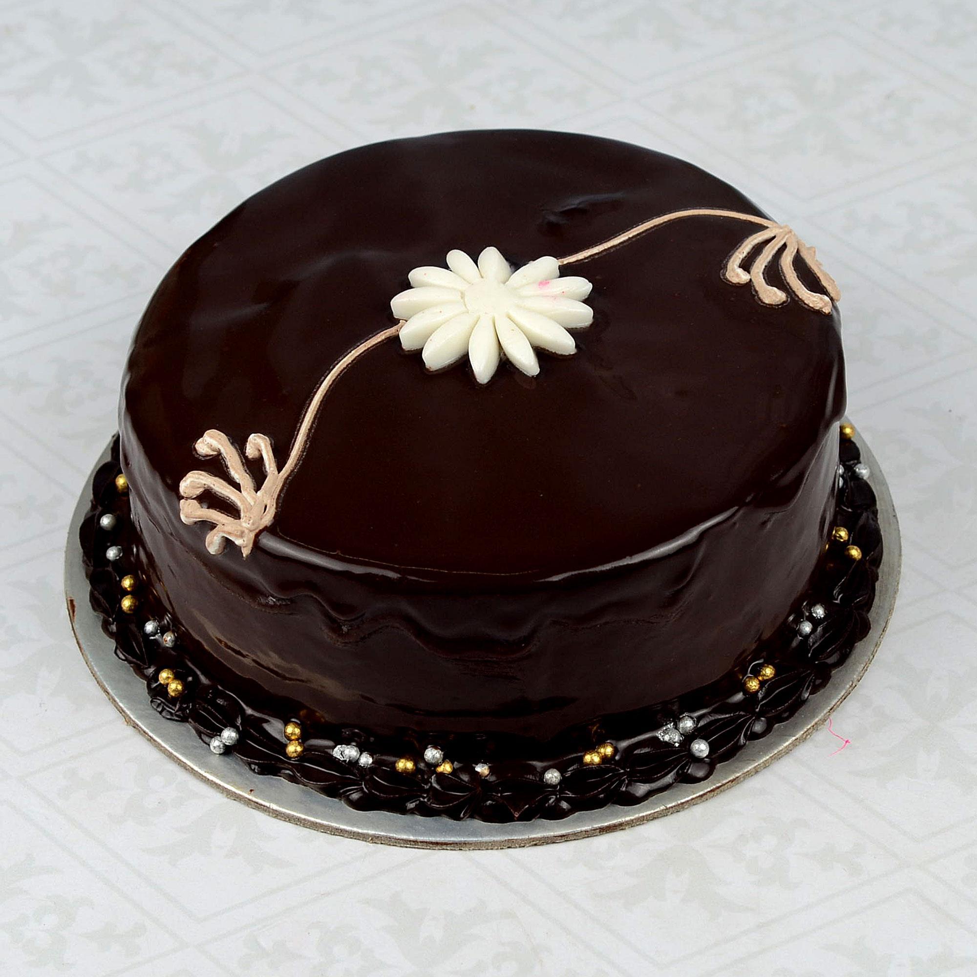 Send 1/2 Kg Chocolate Cake n Greeting Card to India