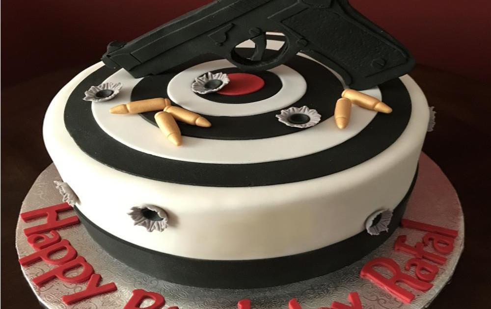 Gun Chocolate Cake - 1.5 Kg. | Special Cakes