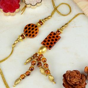 Enticing Amber Rakhi and Lumba pair