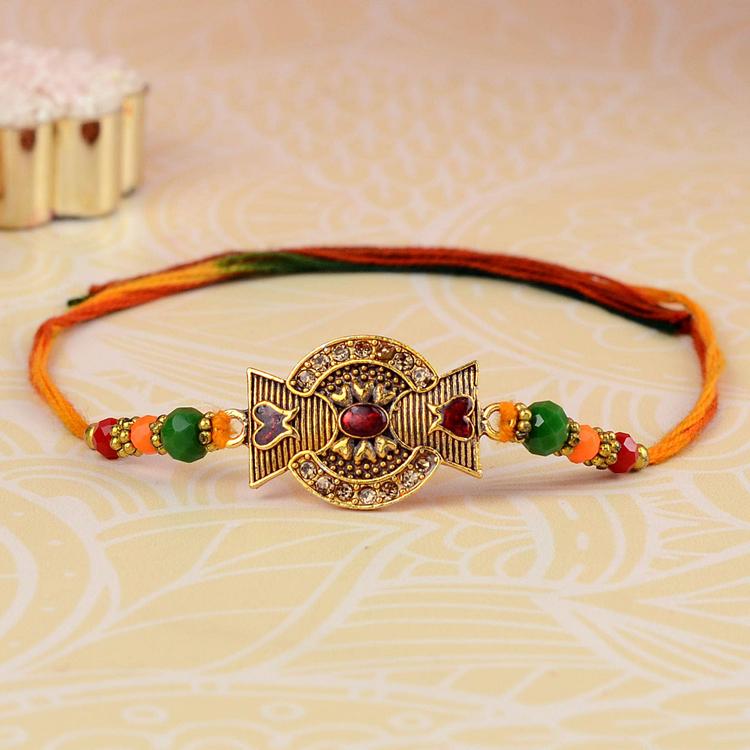 Superb Hearts in Gold and Red Rakhi