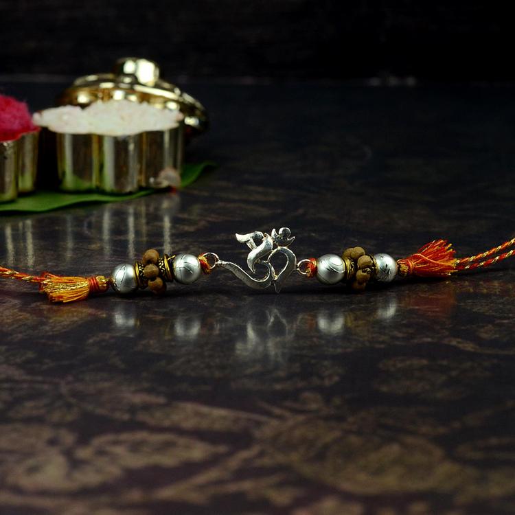 Pure Silver Designer Om Rakhi