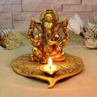 Metallic Ganesh Idol with Attached Diya