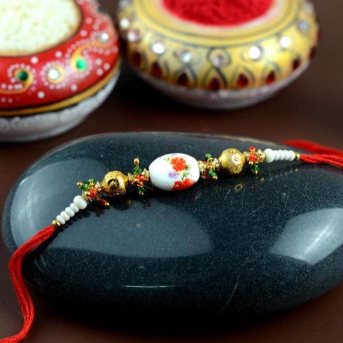 Oriental Printed Oval Bead Rakhi