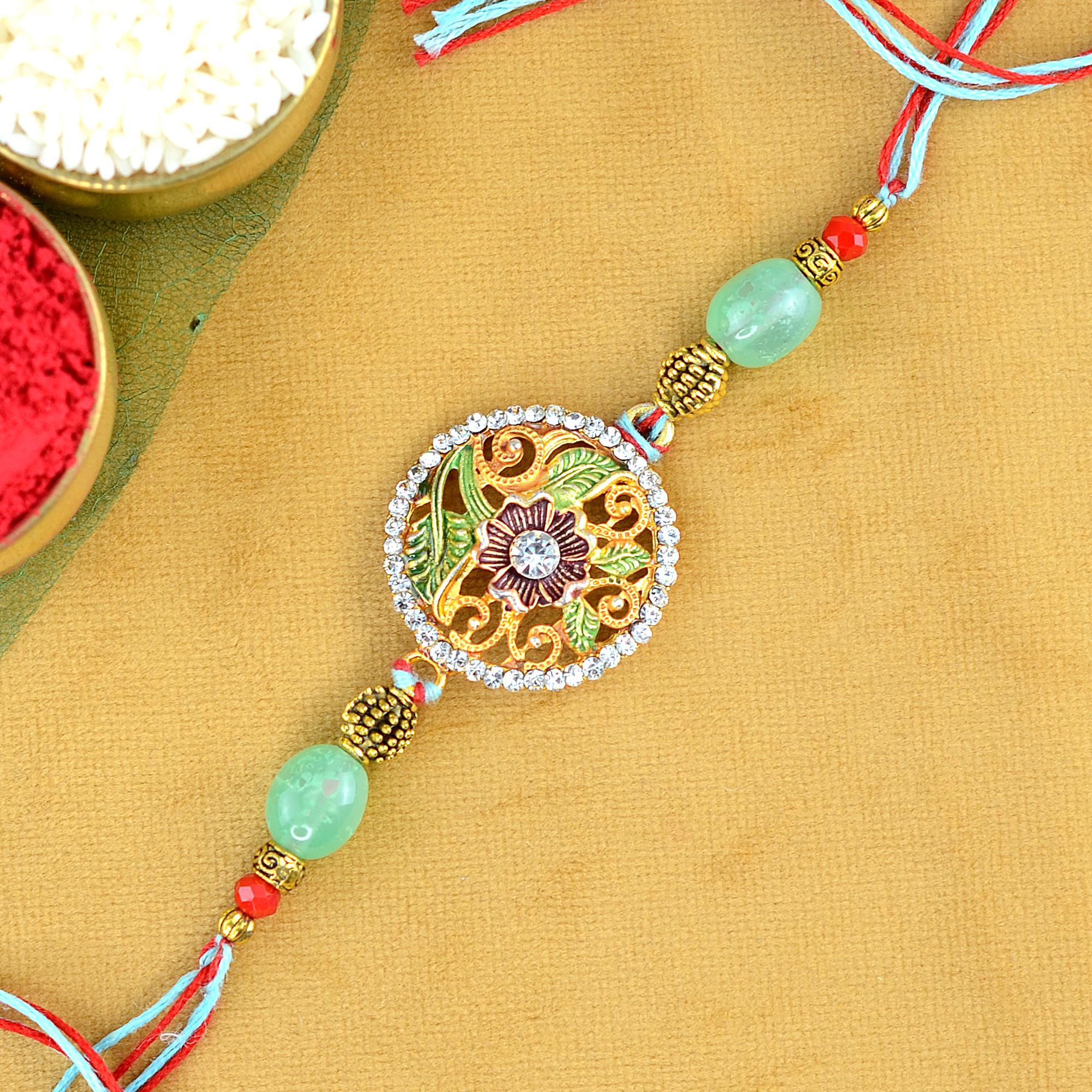 Ornate Gold n Green Rakhi Rakhi to Ludhiana
