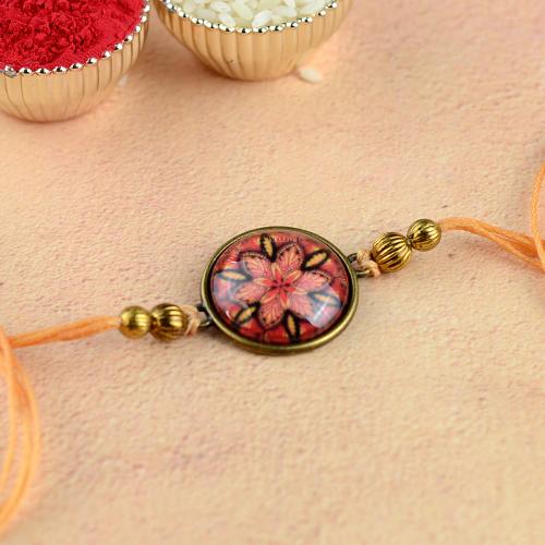 Orange Flower Resin Rakhi