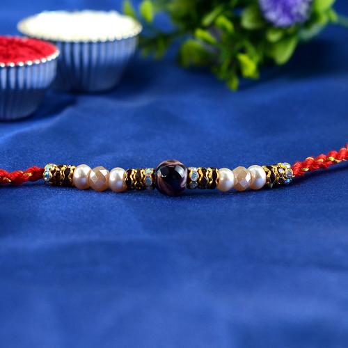 Brown Globe Rakhi
