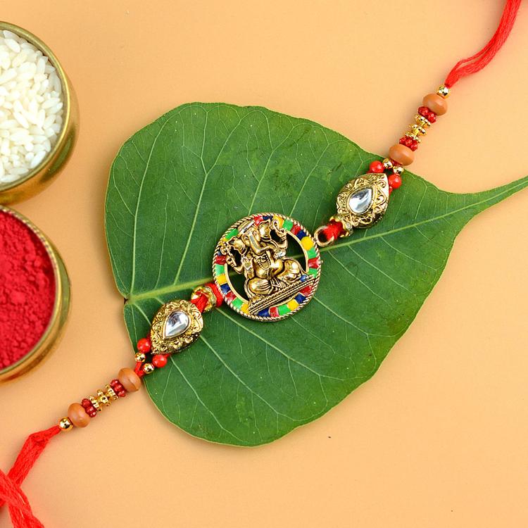 Carved Ganesh Rakhi SR36