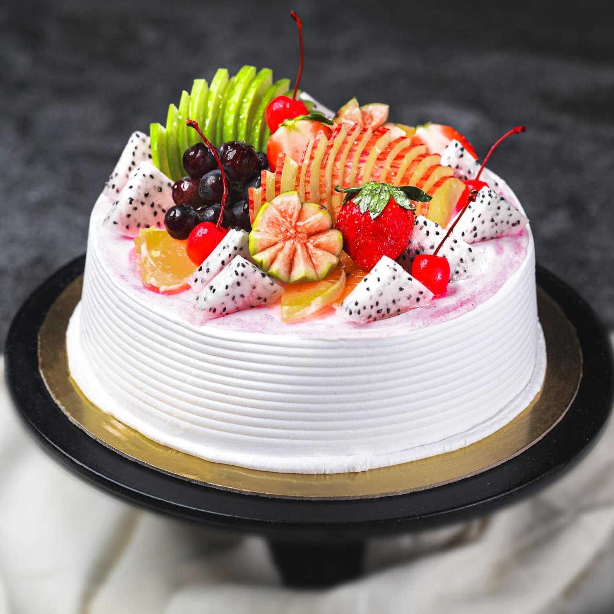 Online sumptuous eggless fresh fruit cake to Mumbai, Express Delivery -  MumbaiOnlineFlorists