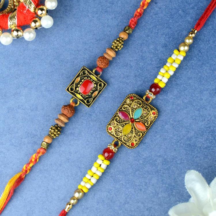 Antique Yellow Metal Rakhi Set
