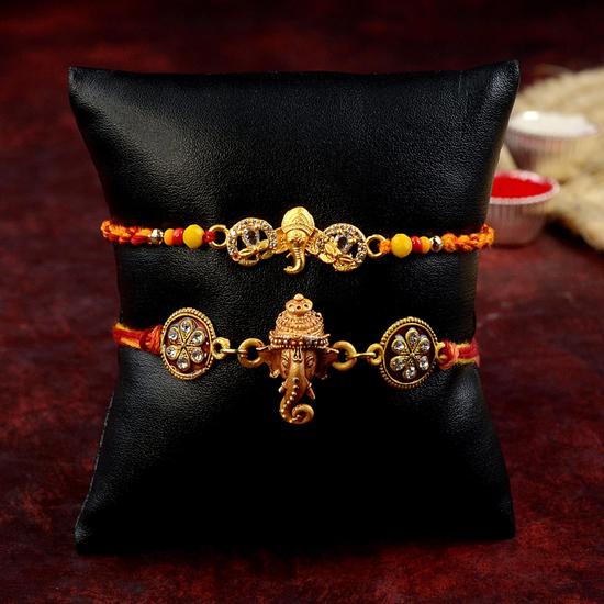 Ganesh Head Rakhi Set
