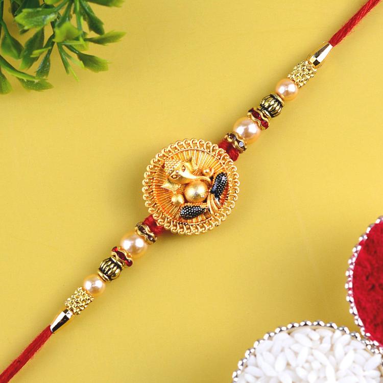 Golden Ganesh Rakhi AU061