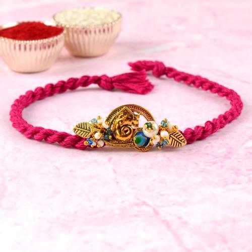Peacock Feather Ganesha Rakhi