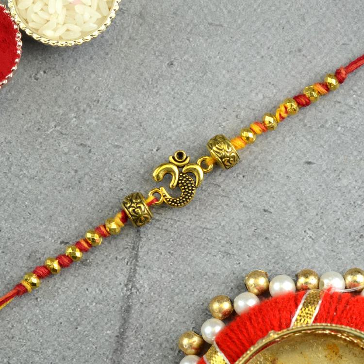 Gorgeous Golden Om Rakhi