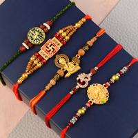 Golden Divinity Rakhi Set