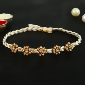 Pearl White n Gold Rakhi Pearl White n Gold Rakhi
