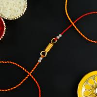 Golden Mesh Mouli Dori Rakhi