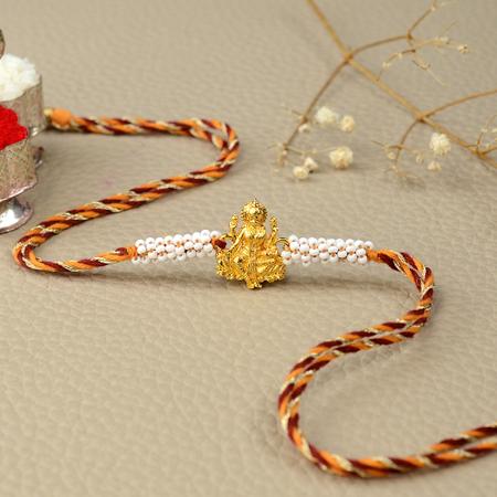 Laxmiji in Glittering Gold Rakhi