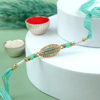 Pale Turquoise Oval Cantaloupe Rakhi