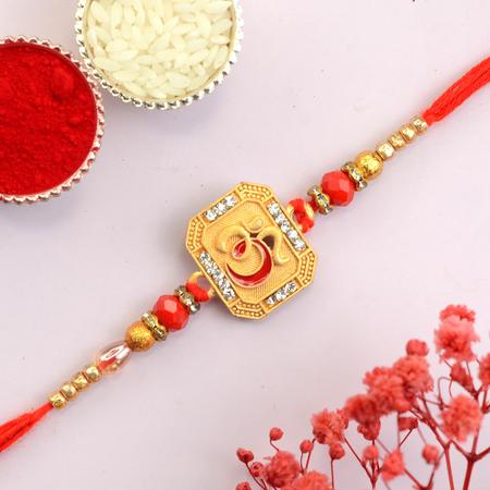 Alluring Gold and Red Om Rakhi