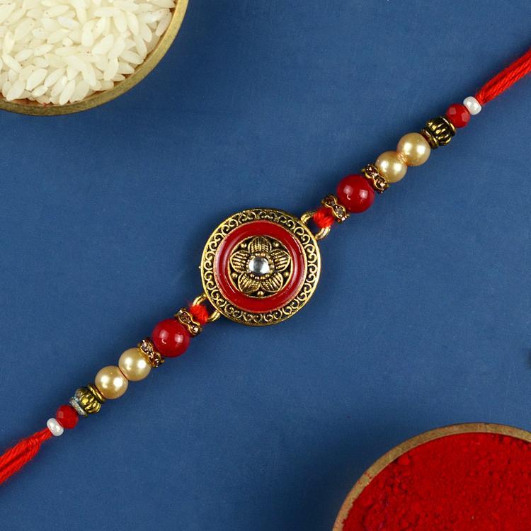 Simple Red and Gold Shield Rakhi