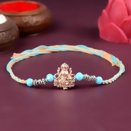 Laxmiji in Rose Gold Rakhi