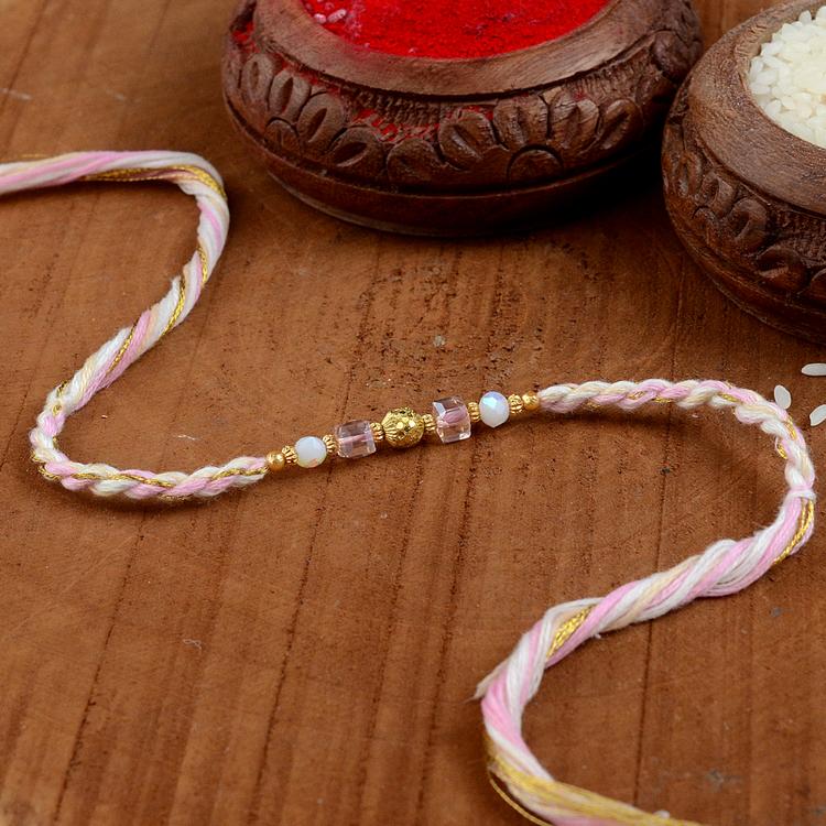 Golden Orb in Pastel Pink Rakhi