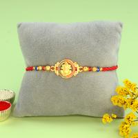 Attractive Ganesh in Oval Rakhi