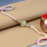 Iron Cross in Clear Stones Rakhi