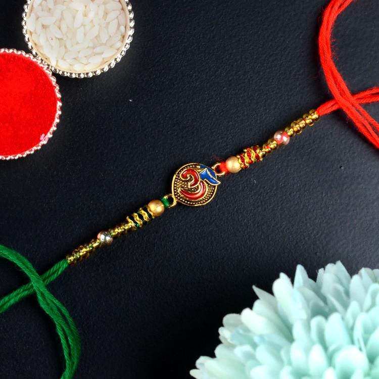Delightful Resin Painted Om Rakhi