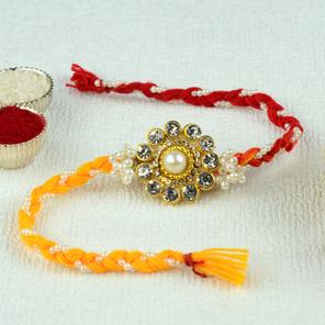 Ornate Jewels and Pearls Rakhi Ornate Jewels and Pearls Rakhi