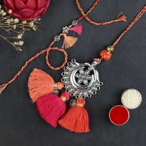 Warm Tassels Rakhi with Lumba Warm Tassels Rakhi with Lumba