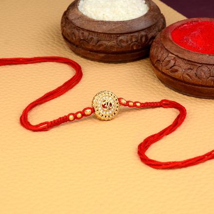 Om in Golden Button AD Rakhi