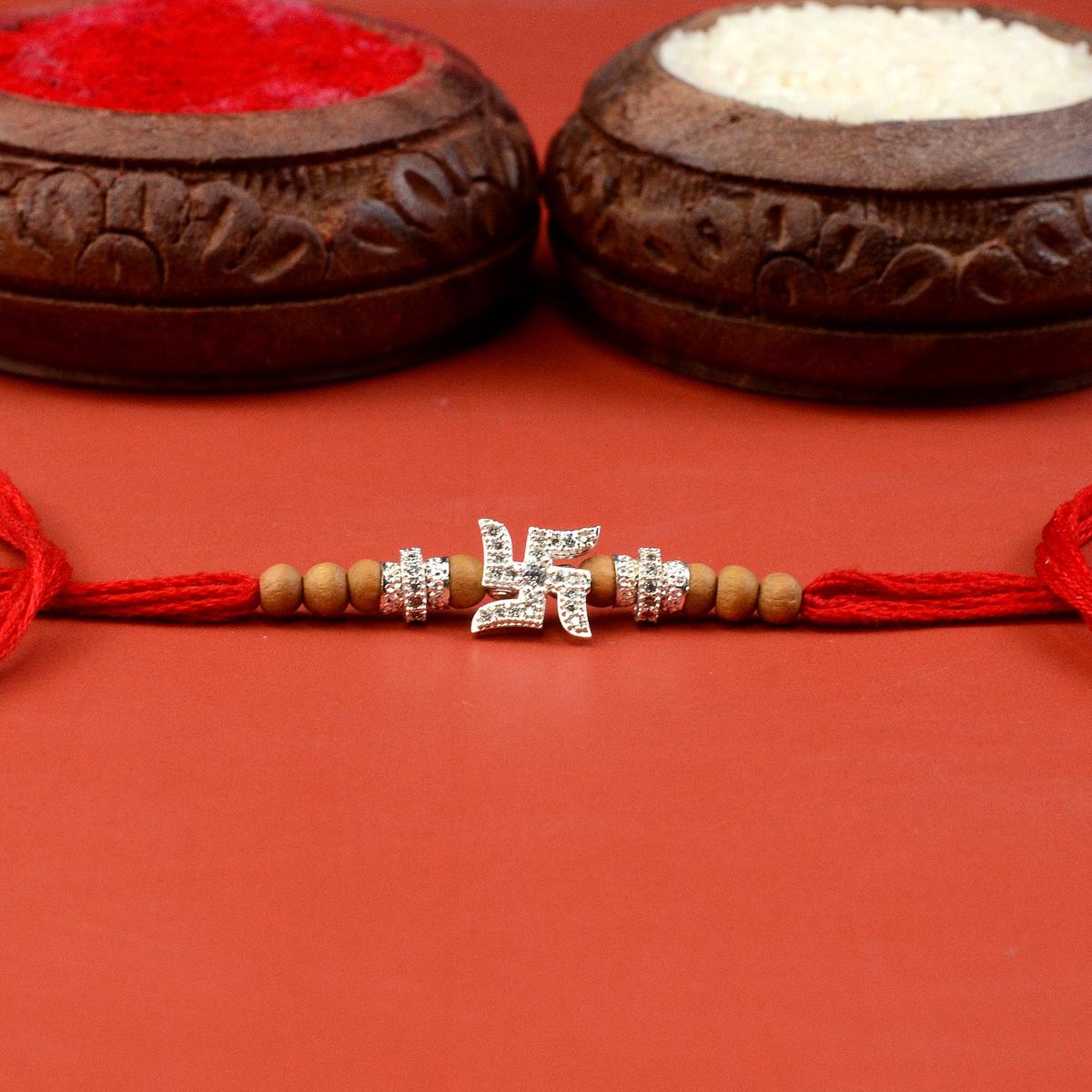 SILVER PLATED SWASTIK RAKHI main image 1