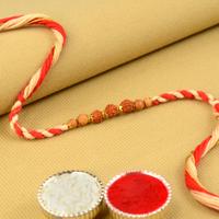 Three Tiny Rudraksh Dori Rakhi