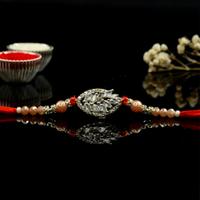 Ferns Stones in Oval Ring Rakhi