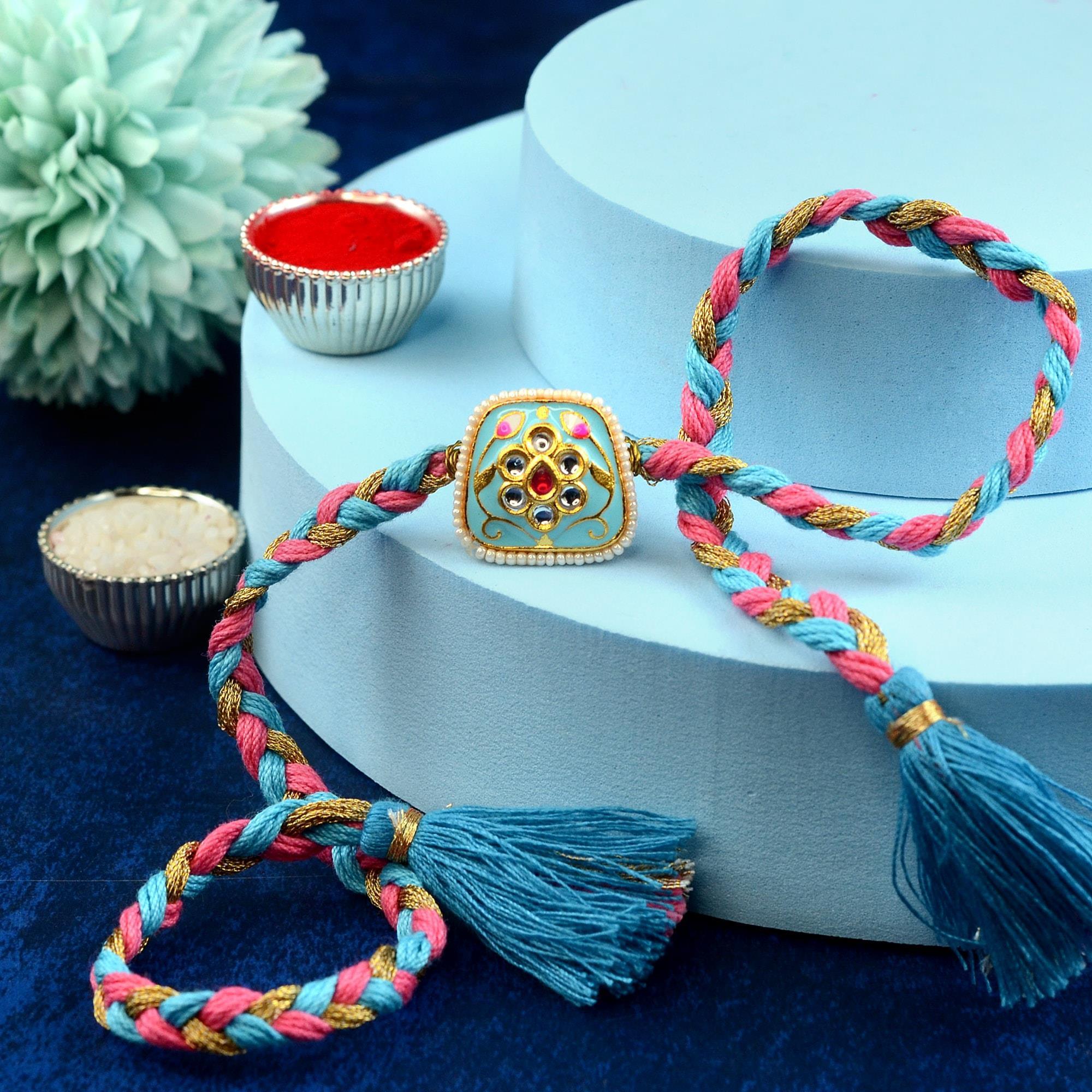 Elegant Sky Blue Motif Rakhi | Designer Rakhi