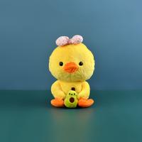 Duck Holding an Avocado Plush Toy