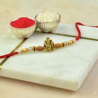 Intricate Seated Vara Ganesh Rakhi