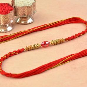 Splendid Spheroid Ruby Dori Rakhi Splendid Spheroid Ruby Dori Rakhi