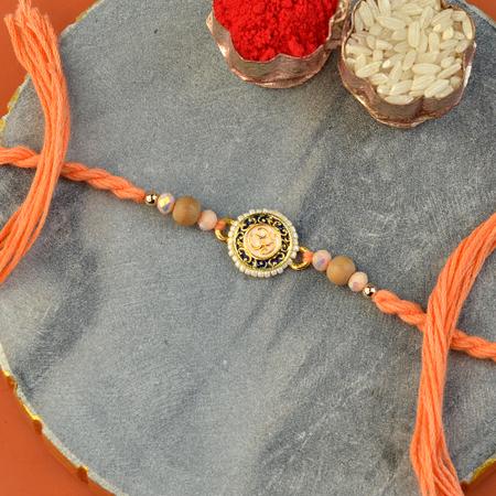 Pearly Canopy Om Rakhi