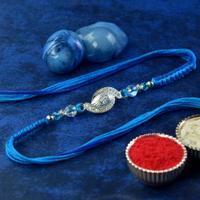 Caring Silver Eye Rakhi