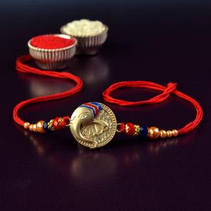Round Medallion of Ganesh Rakhi Round Medallion of Ganesh Rakhi