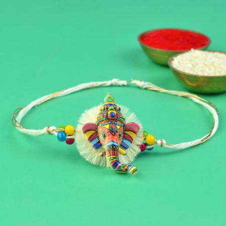 Colourful Tribal Ganesh Head Rakhi