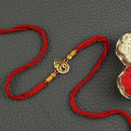 Dazzling Teardrop Pendant Om Rakhi