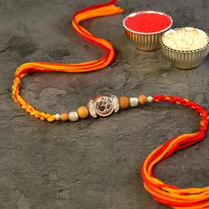 Om - Silver Ring Segments Rakhi Om - Silver Ring Segments Rakhi