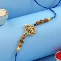 Radiant Peacock Feather Rakhi