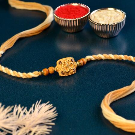 Om - Golden Square Warm Tone Rakhi