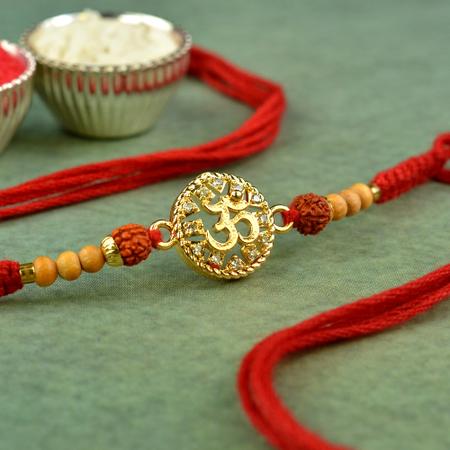 Om - Spaced Crystals Rakhi
