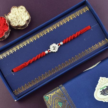 White Metal Cutout Om Rakhi